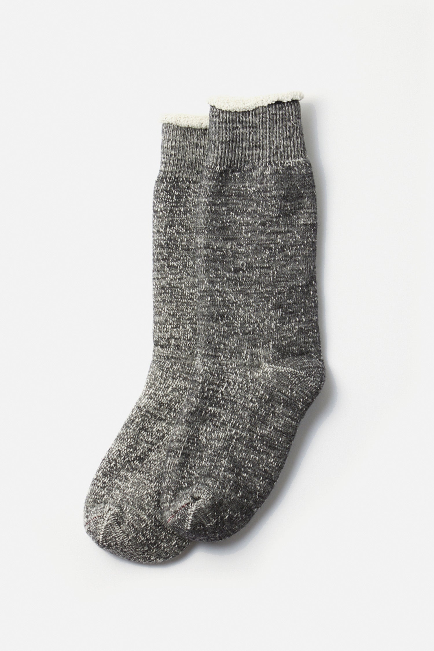 A pair of RoToTo Double Face Crew Socks in Charcoal, made in Japan from soft merino wool with a ribbed cuff, is laid flat against a white background.