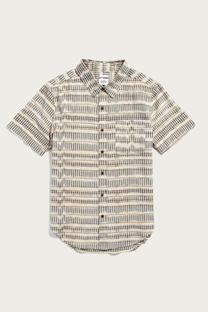 The Malcolm Shirt by Bridge & Burn features a sustainable, organic cotton short sleeve button-up with a collar and single chest pocket, showcasing a brown, black, and white Mushroom Ikat Stripe geometric pattern.