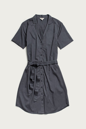 The Bridge & Burn Sofia Shirt Dress in light navy features short sleeves, a button front, a collar, and a matching fabric belt, shown laid flat on a light background.