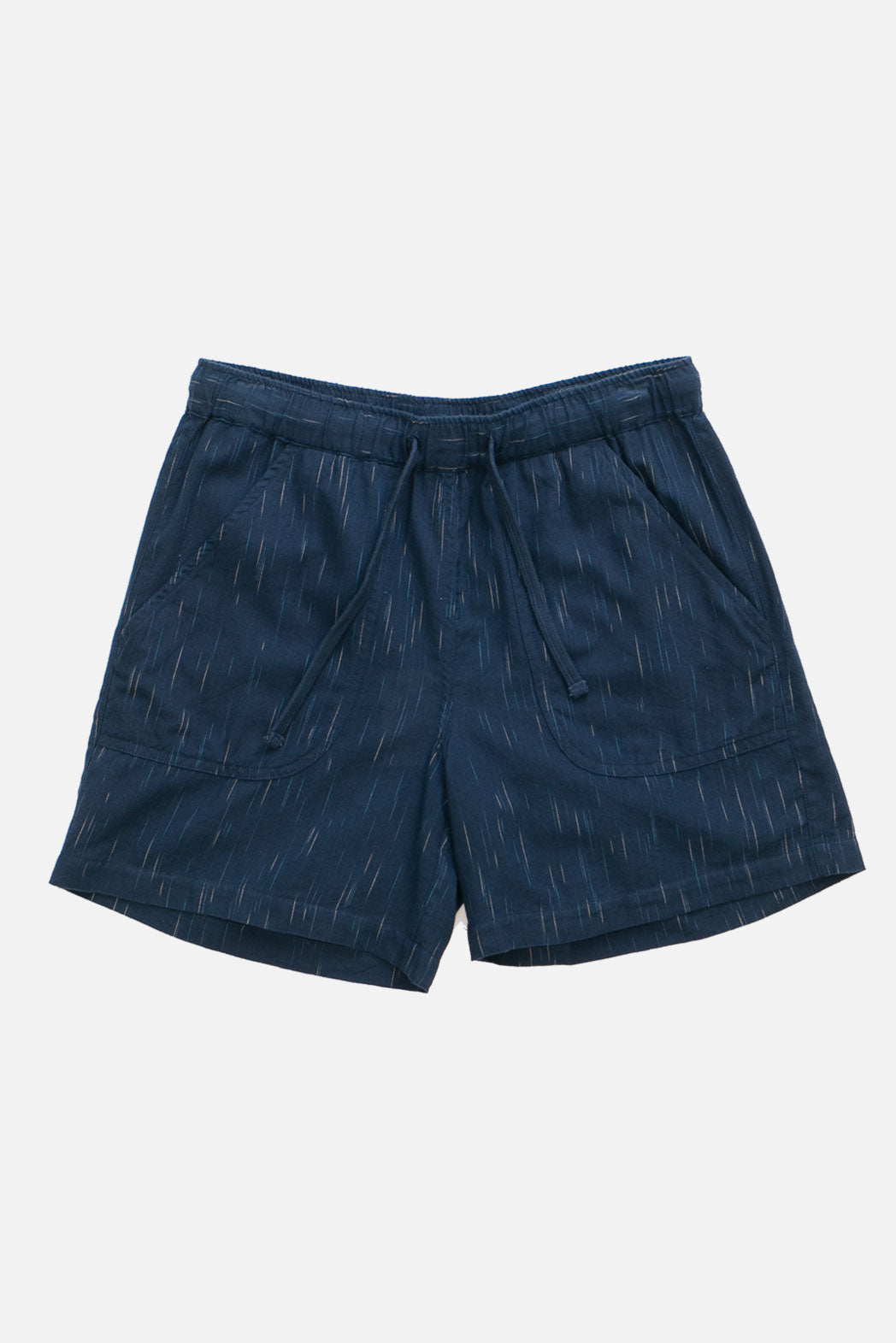 The Bridge & Burn Nico Short in Navy Space Dye features an elastic waist, subtle white pinstripes, two side pockets, and is crafted from organic cotton. Displayed flat on a white background.